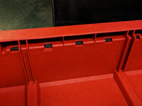 04 — Inside detail showing five black retention-tab ends