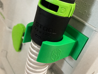 Green HoseSnap clip installed on compatible Festool Systainer with D27 hose