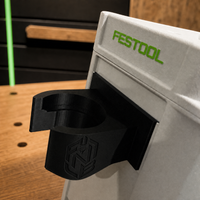 Black HoseSnap clip installed in compatible Festool Systainer side channel