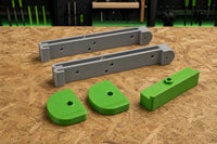 04 — CamDock™ five-piece PETG kit with two main mounts, two cam locks, and one lower stop