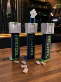 05 — Three Domino Dispenser examples with the center dispensing mechanism open