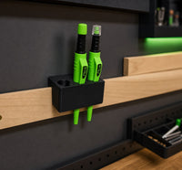 06 — Pica holder installed with two demonstration tools and one empty slot